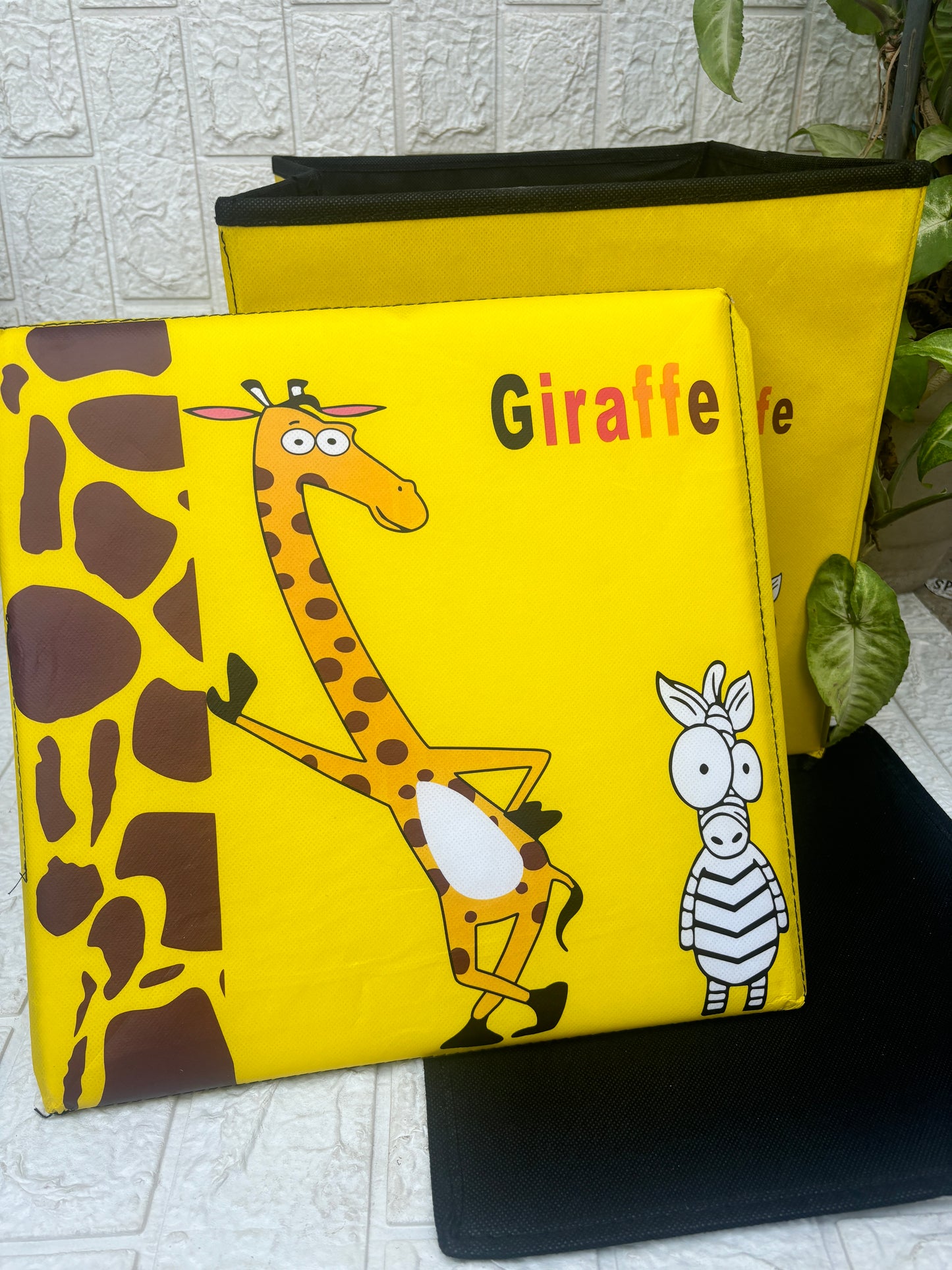Giraffe print folding storage organiser and stool for kids