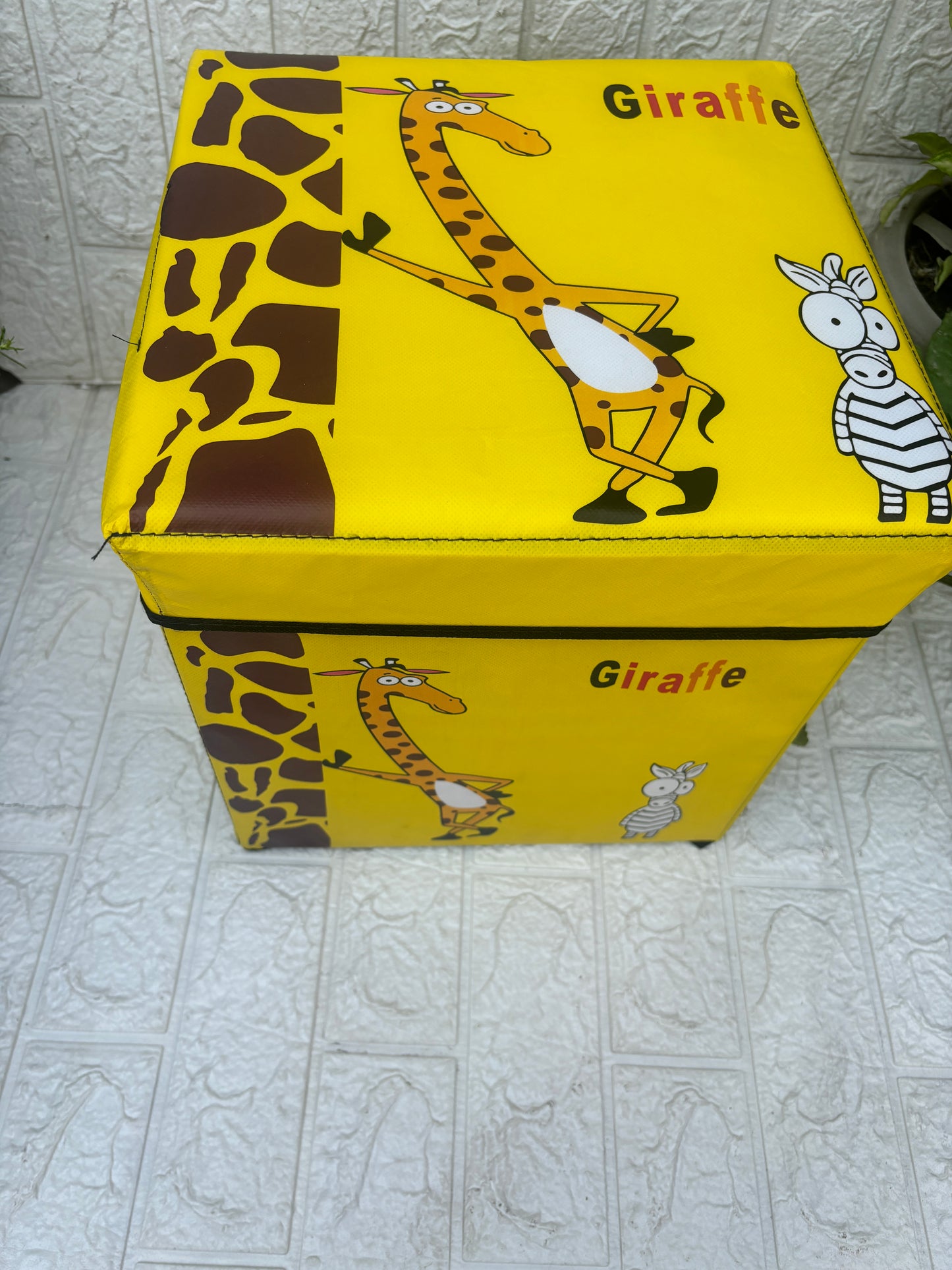 Giraffe print folding storage organiser and stool for kids