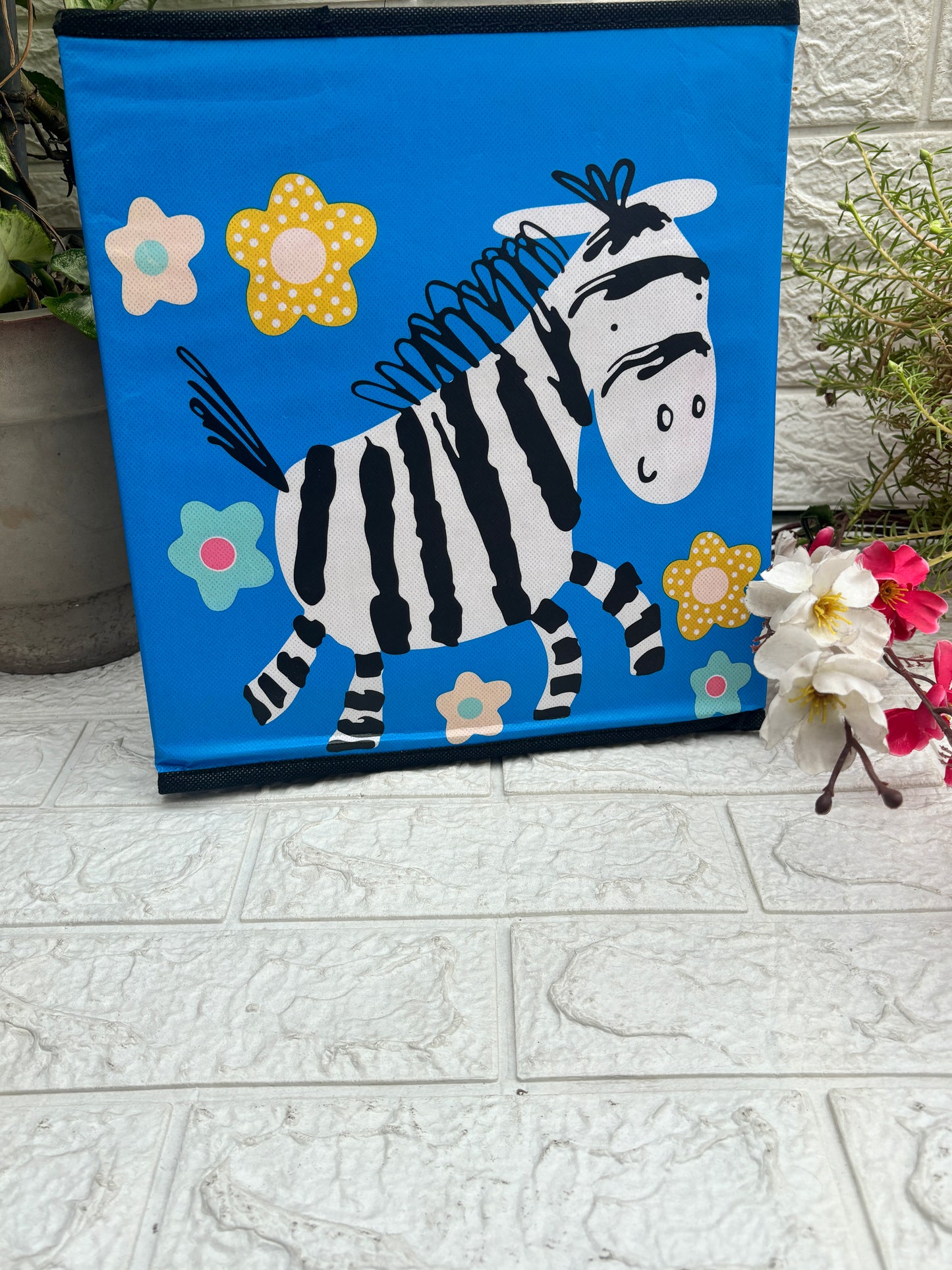 Giraffe print folding storage organiser and stool for kids