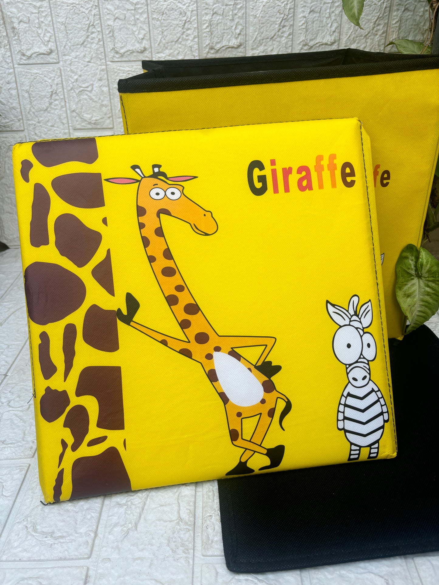 Giraffe print folding storage organiser and stool for kids