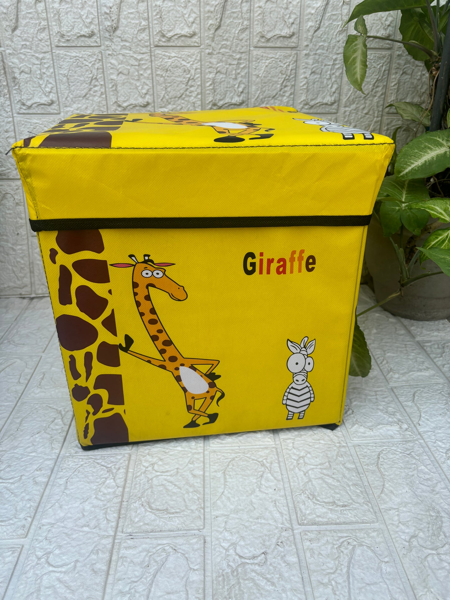 Giraffe print folding storage organiser and stool for kids
