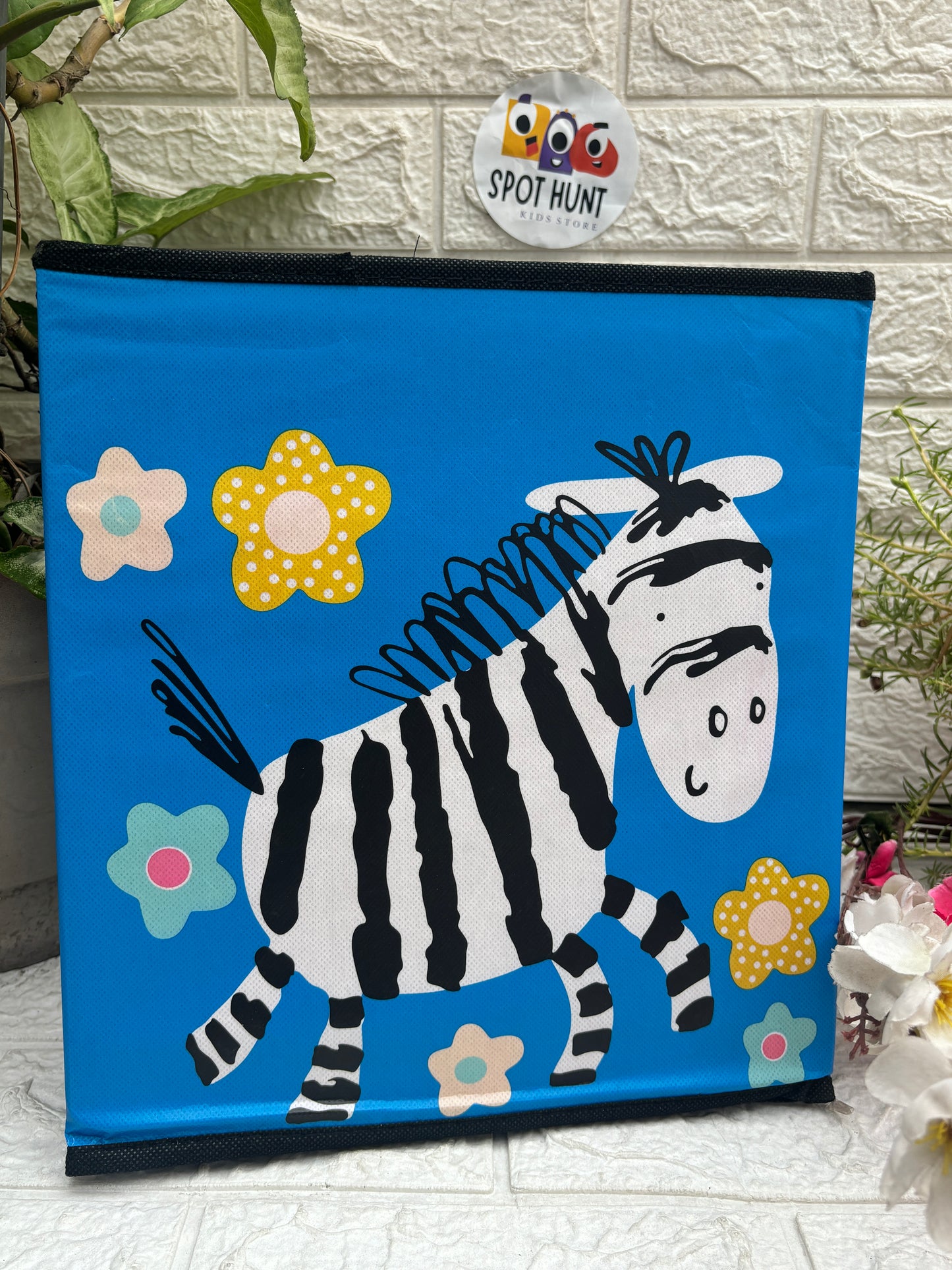 Giraffe print folding storage organiser and stool for kids