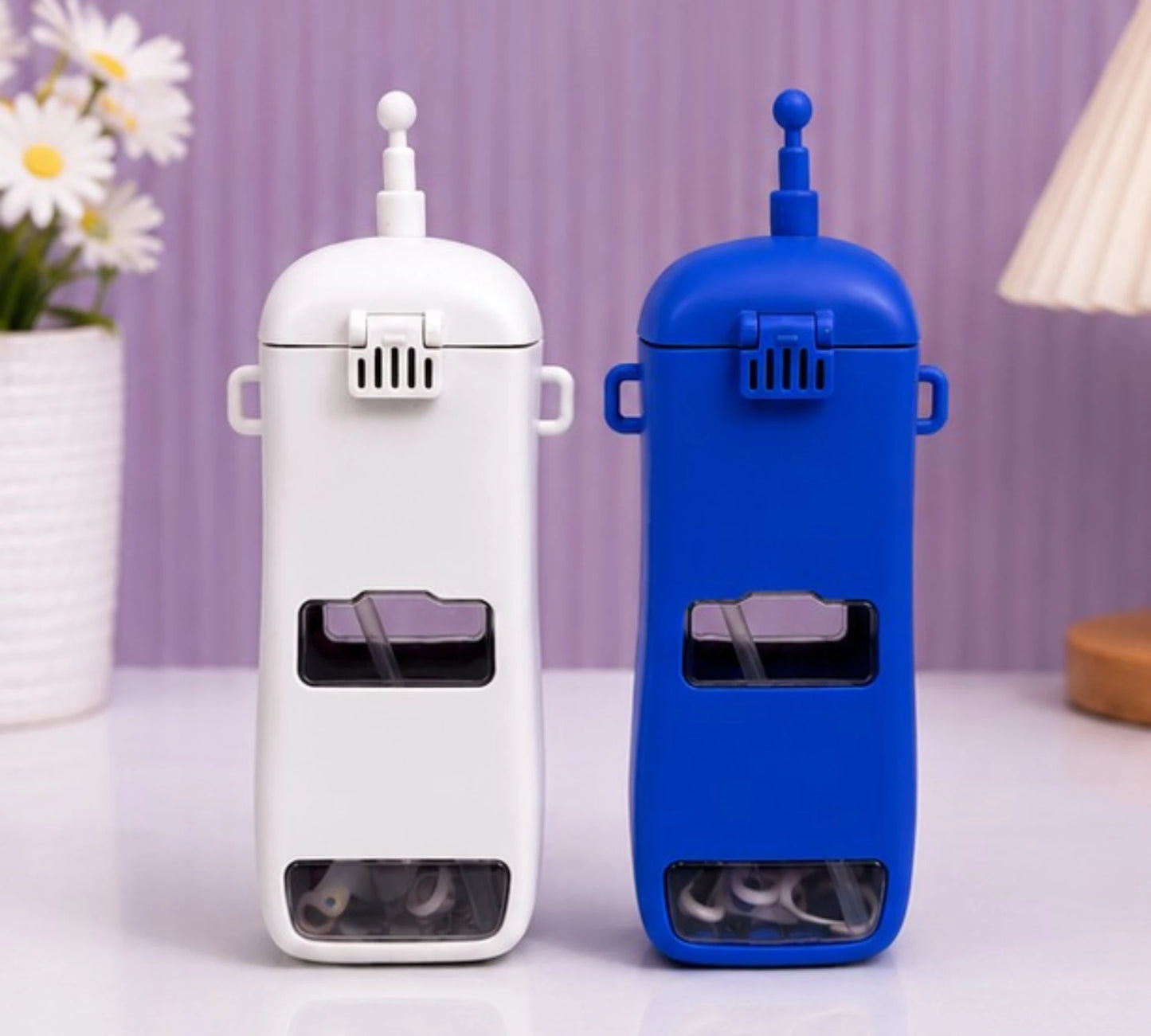 Walkie talkie shape kids sipper water bottle with straw and carry handles.